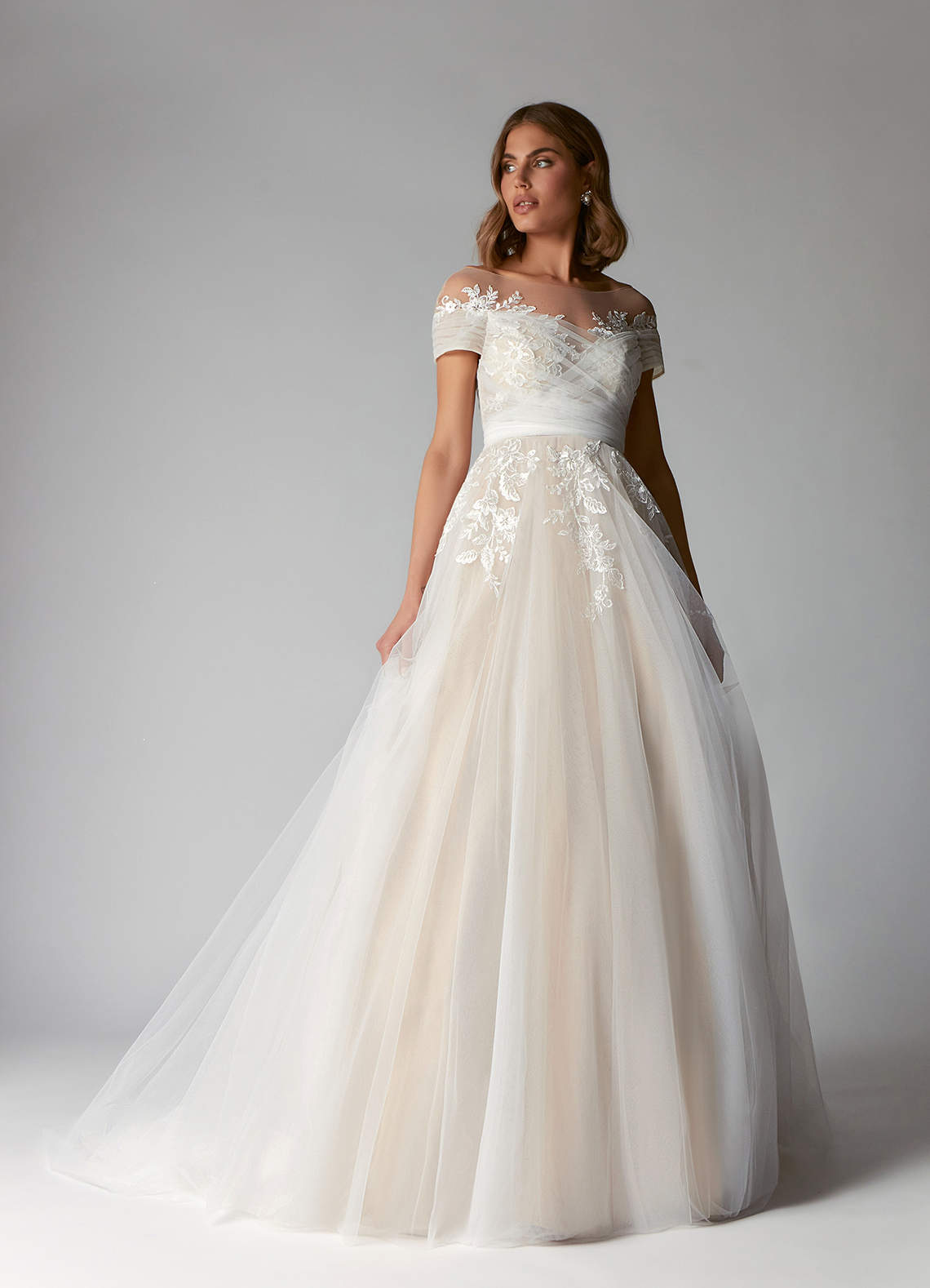 Azazie Cindy Wedding Dresses Diamond White Champagne A-Line Illusion Off-The-Shouler Lace Tulle Dress image1