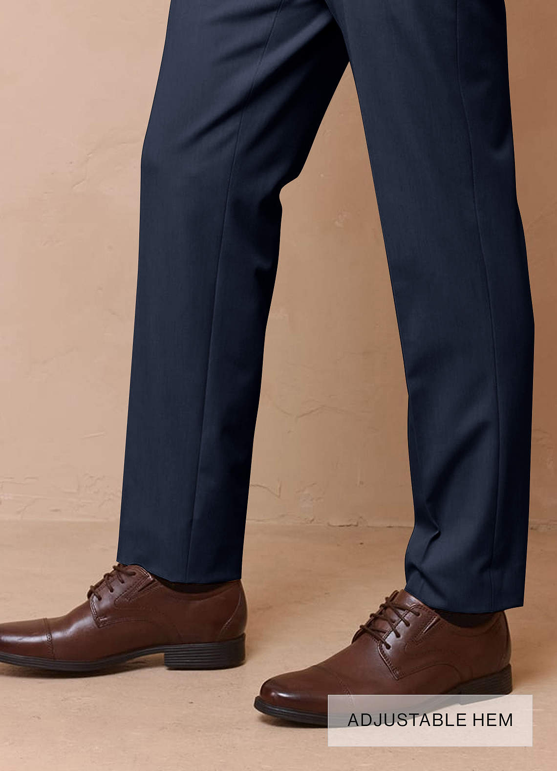 blue dress pants and black shoes The Impeccable Performance Pant Dark Blue 42 main image 1