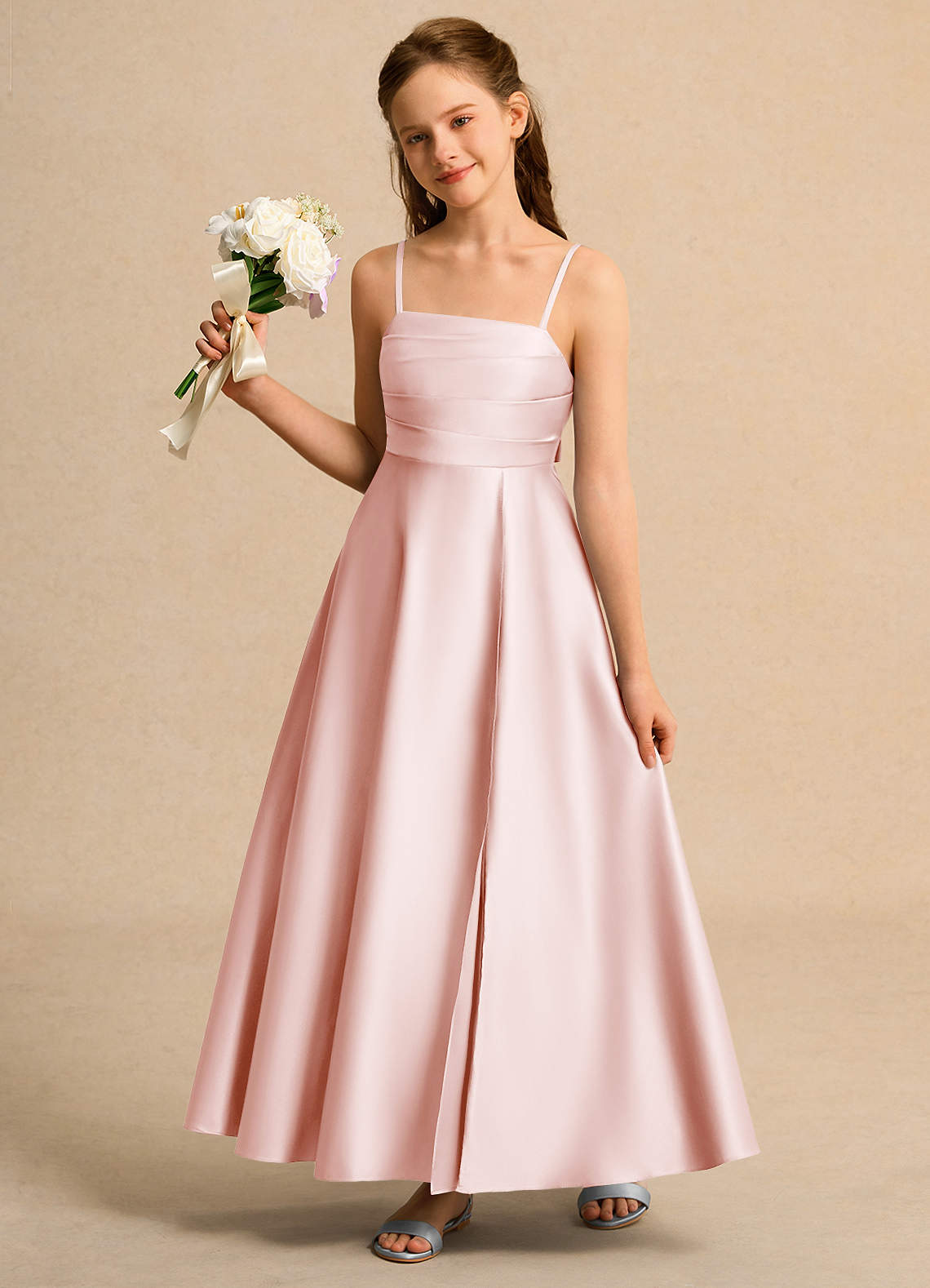 Azazie Pebbles Girls Formal Blushing Pink A-Line Pleated Matte Satin Dress  | Azazie DE
