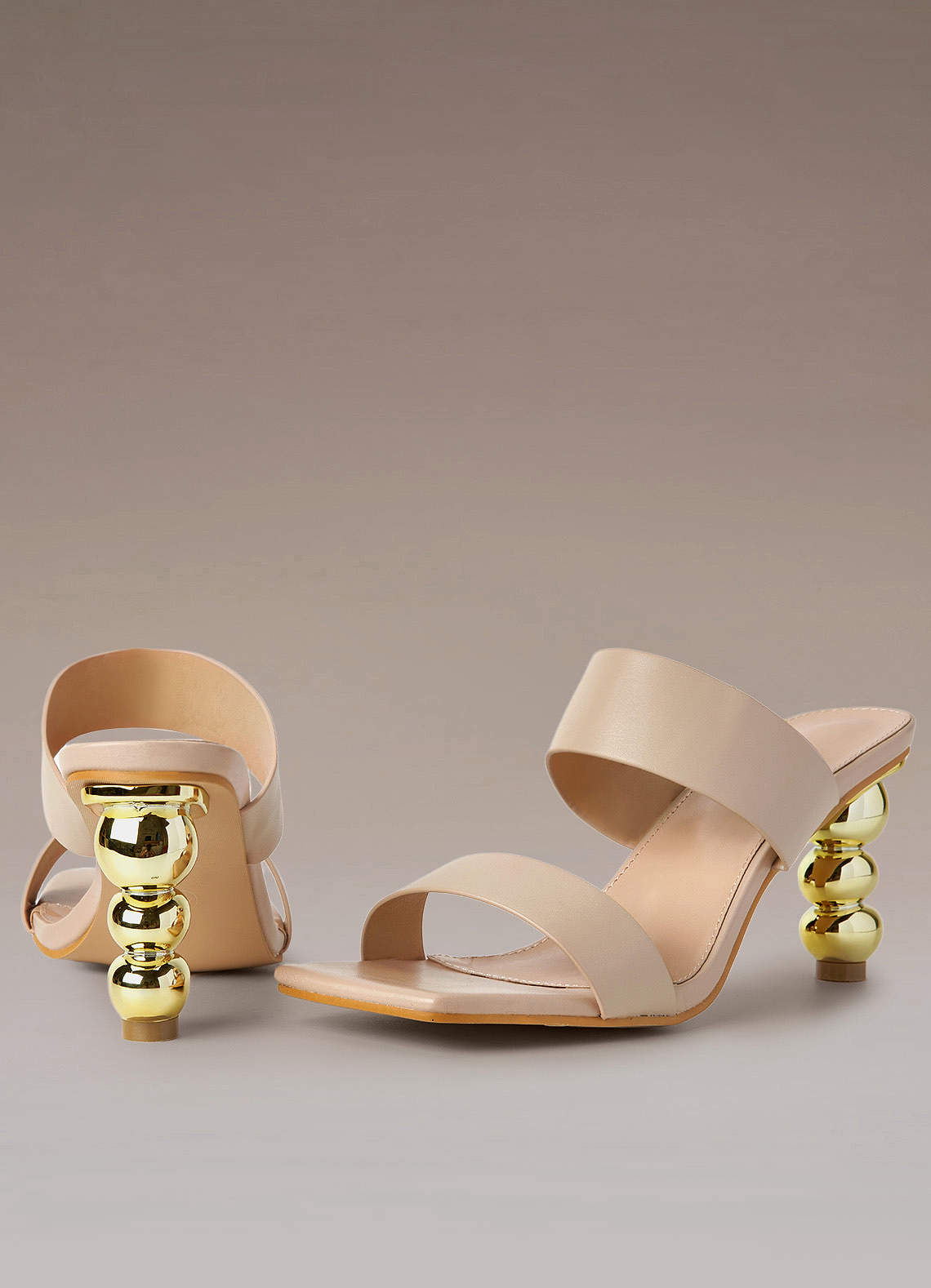 Backless high clearance heel sandals