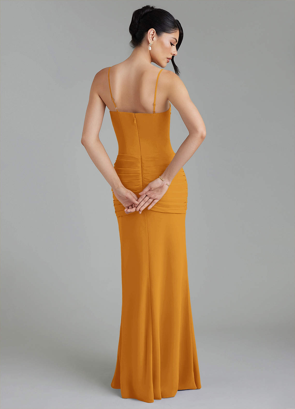 cassie gold dress Liquid gold, sculpted to flatter. A silky satin off-shoulder gown with intricately overlapping pleats across the bodice designed to hug, drape, and move beautifully with every step. Book an appointment Sophisticated and playful Cassie Rose Gold Gown