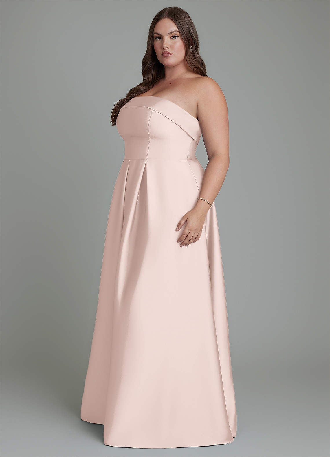blush pink strapless bridesmaid dresses Azazie A-Line Floor-Length Stretch Satin this gown was designed