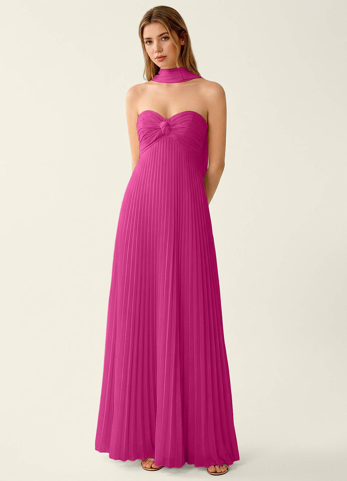 dark pink chiffon dress This is a strapless hot pink chiffon dress featuring elegant draped and pleated fabric. It is sewn with a built-in structured corset to ensure a flattering fit, along with a special internal