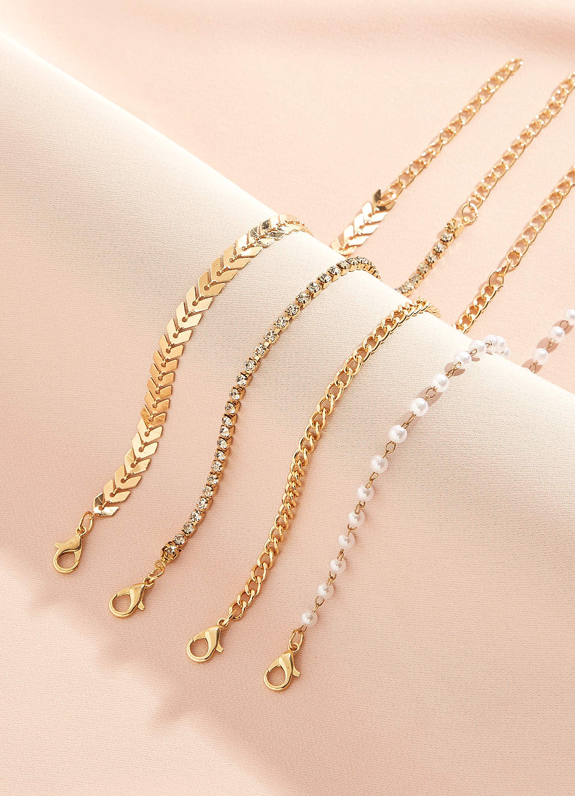 front Encountering Elegance Gold Pearl 4-Piece Bracelet Set
