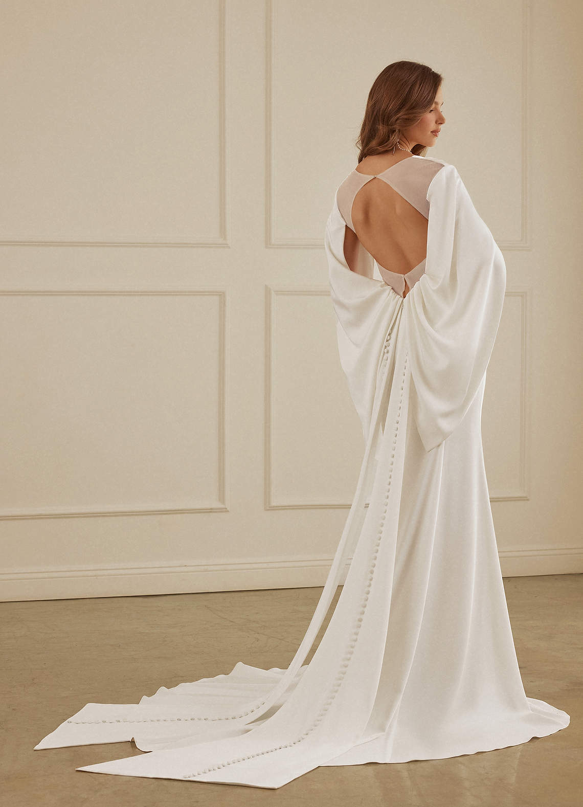 Christian Siriano Bridal for Azazie 2001 Wedding Dresses Plunging Cape Sleeve Crepe Back Satin Mermaid Gown image1