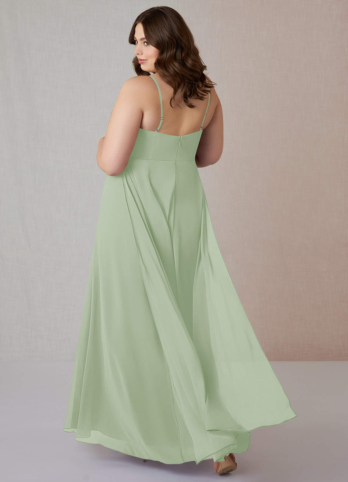 azazie emerald green bridesmaid dresses Azazie's dark green bridesmaids dresses in outdoor wedding