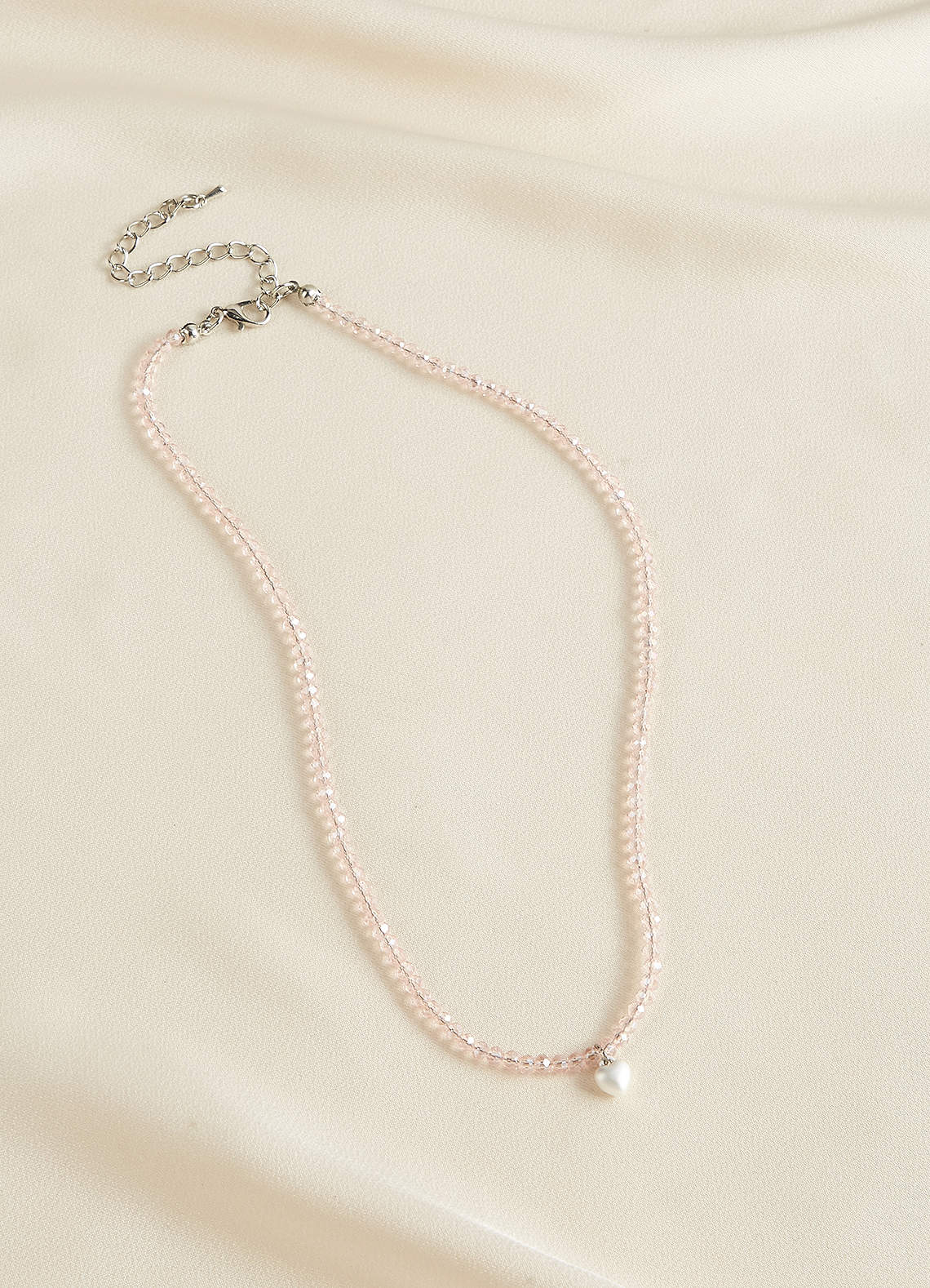 front Rodnande rosa pärlhalsband