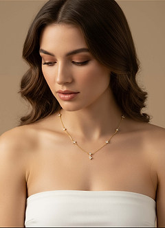 front Halsband med fyrbladig blomma i zirkon