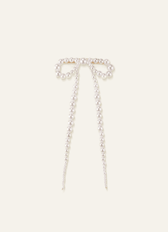 Pasador con lazo de perlas