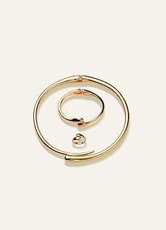 Smyckeset med droppar i guld