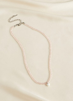 front Rodnande rosa pärlhalsband
