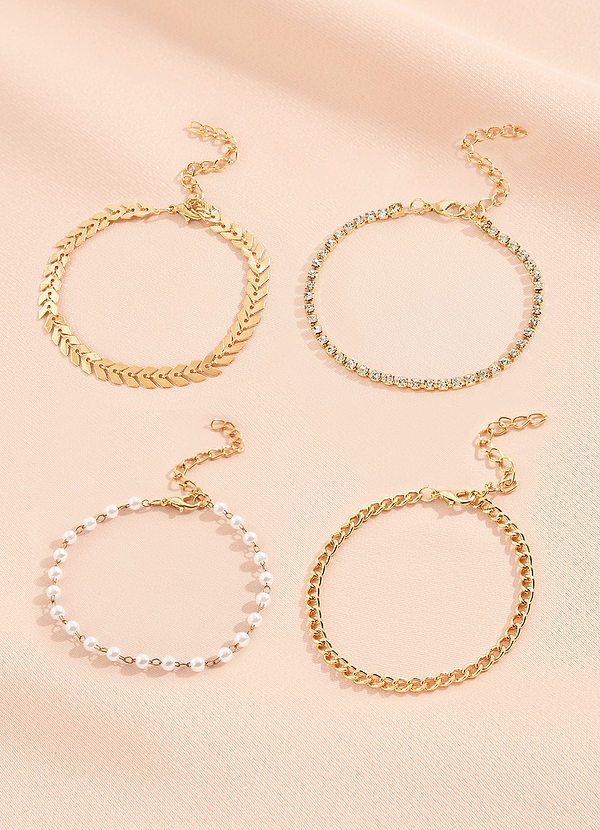 front Encountering Elegance Gold Pearl 4-Piece Bracelet Set